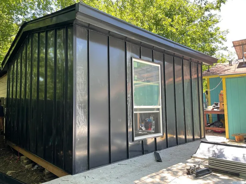 Black standing seam metal wall panels for Roof Inspection in Dickinson