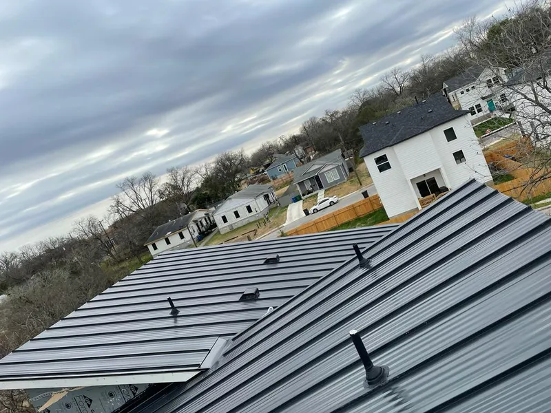 Standing seam metal roof panels with vents for Skylight Repair in Dickinson